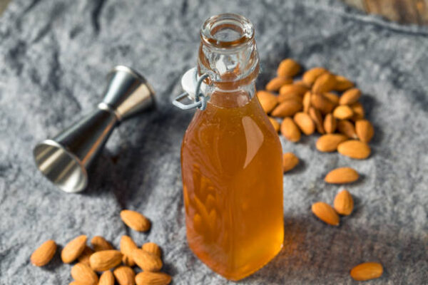 Homemade organic almond orgeat syrup in a bottle