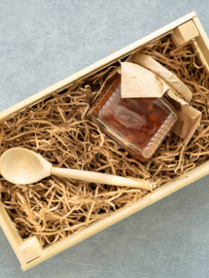 Preparing gift box with homemade apple jam. zero waste eco friendly.